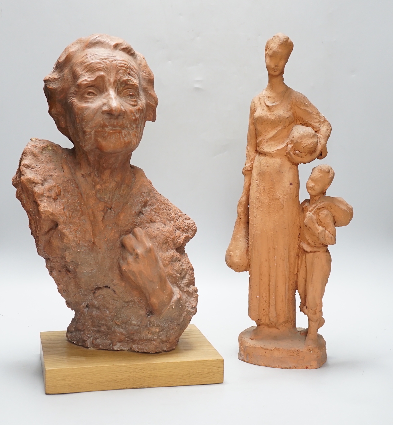 Marcus Cornish (1964-) - ‘’Refugee’’, a terracotta sculpture and one other terracotta sculpture of a mother and child, indistinctly signed, the largest 46cm high (2)